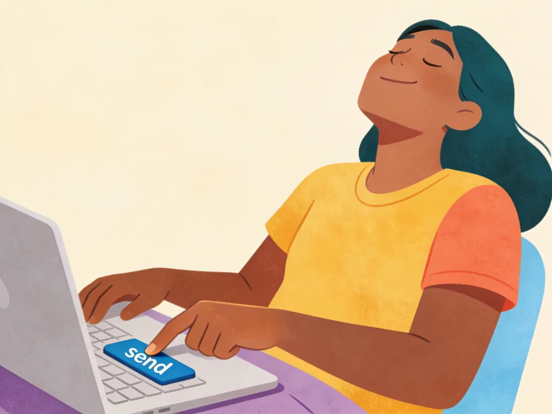 A person clicking send on a laptop and leaning back with relief.