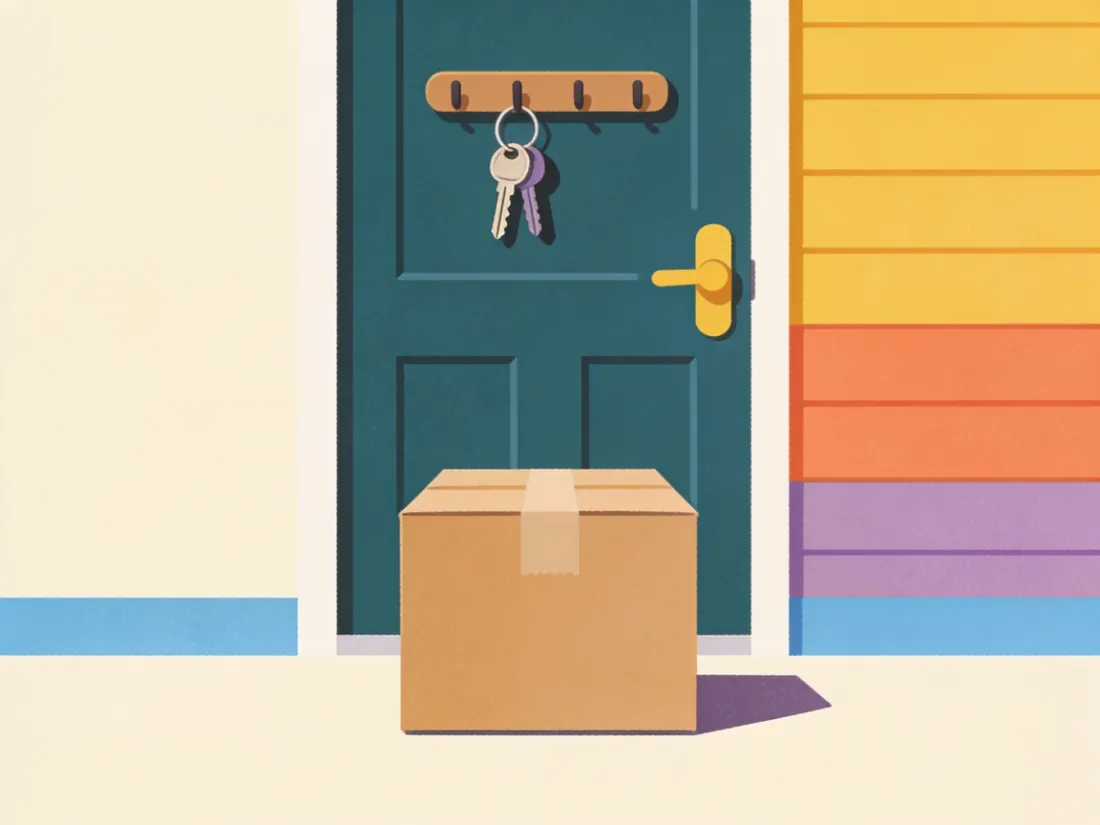 A package placed right in front of the door with keys hanging above it.